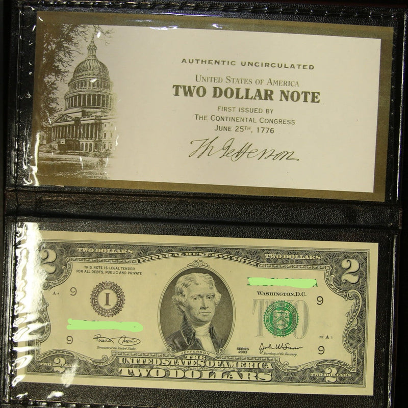 2003 Uncirculated $2 note & World Reserve Monetary Exchange Leather Bill protector. Store