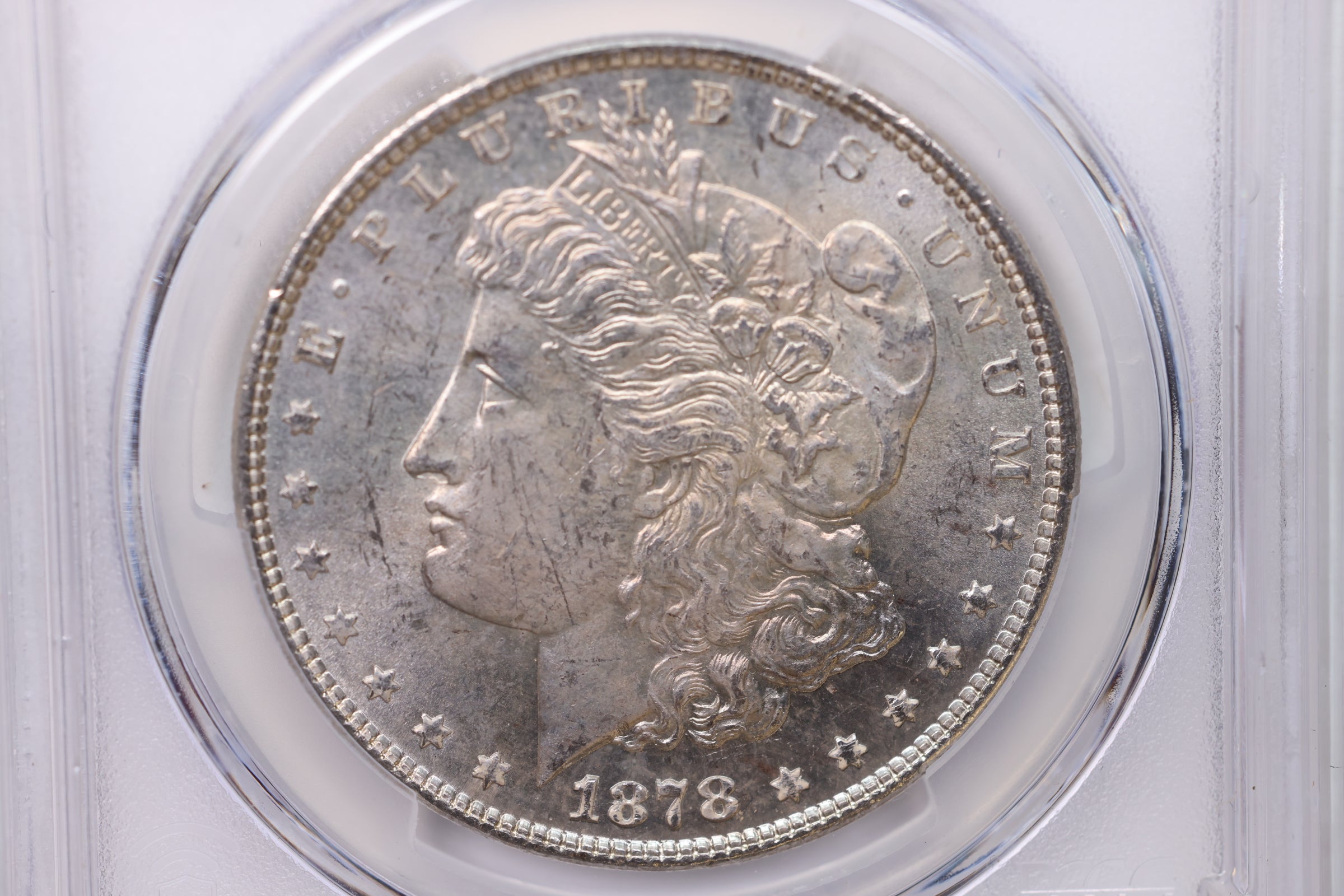 1878 Morgan Silver Dollar., 7/8 T.F.., PCGS Certified, MS63. SALE #880