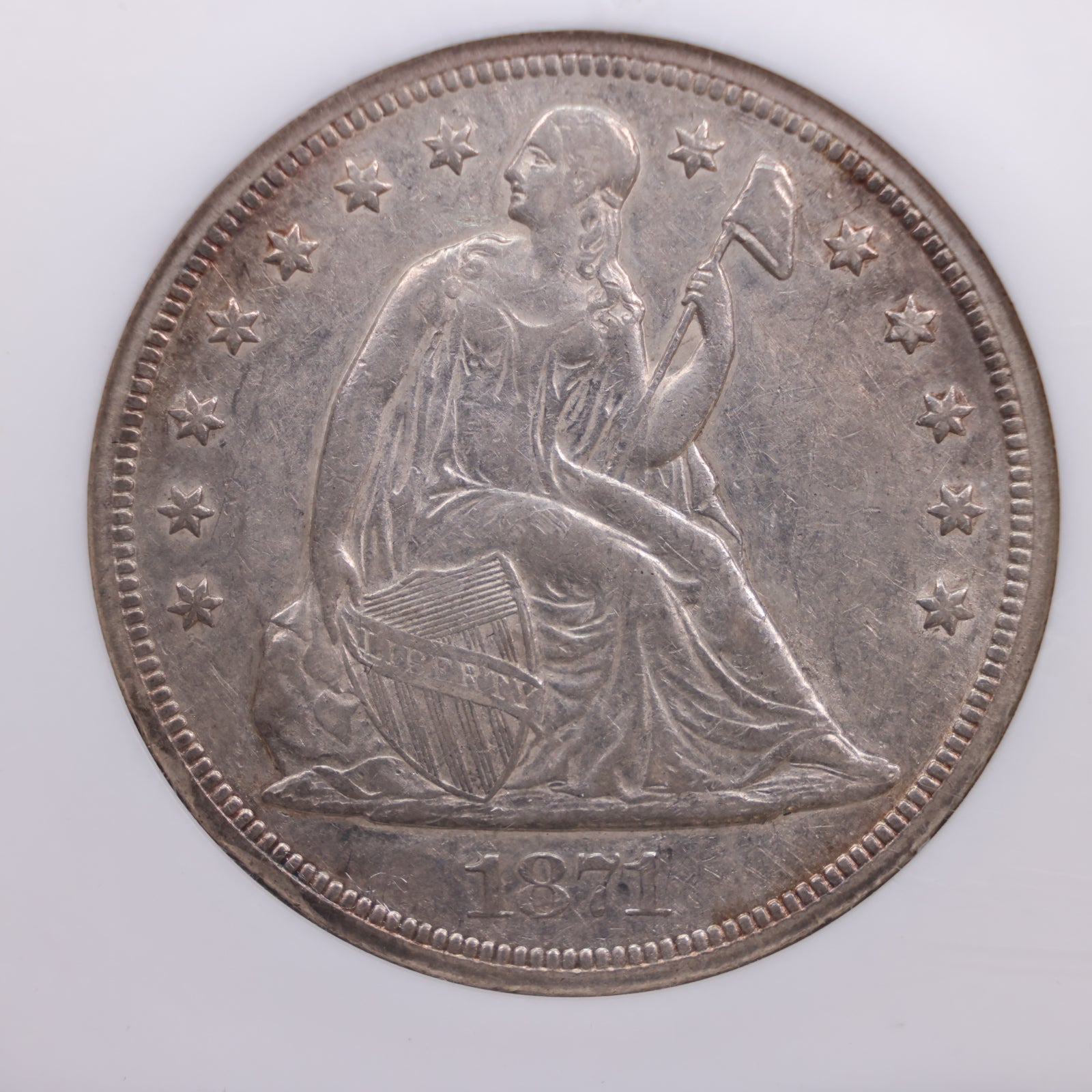 1871 Seated Liberty Silver Dollar., NGC Certified AU-50., Store #GDR01