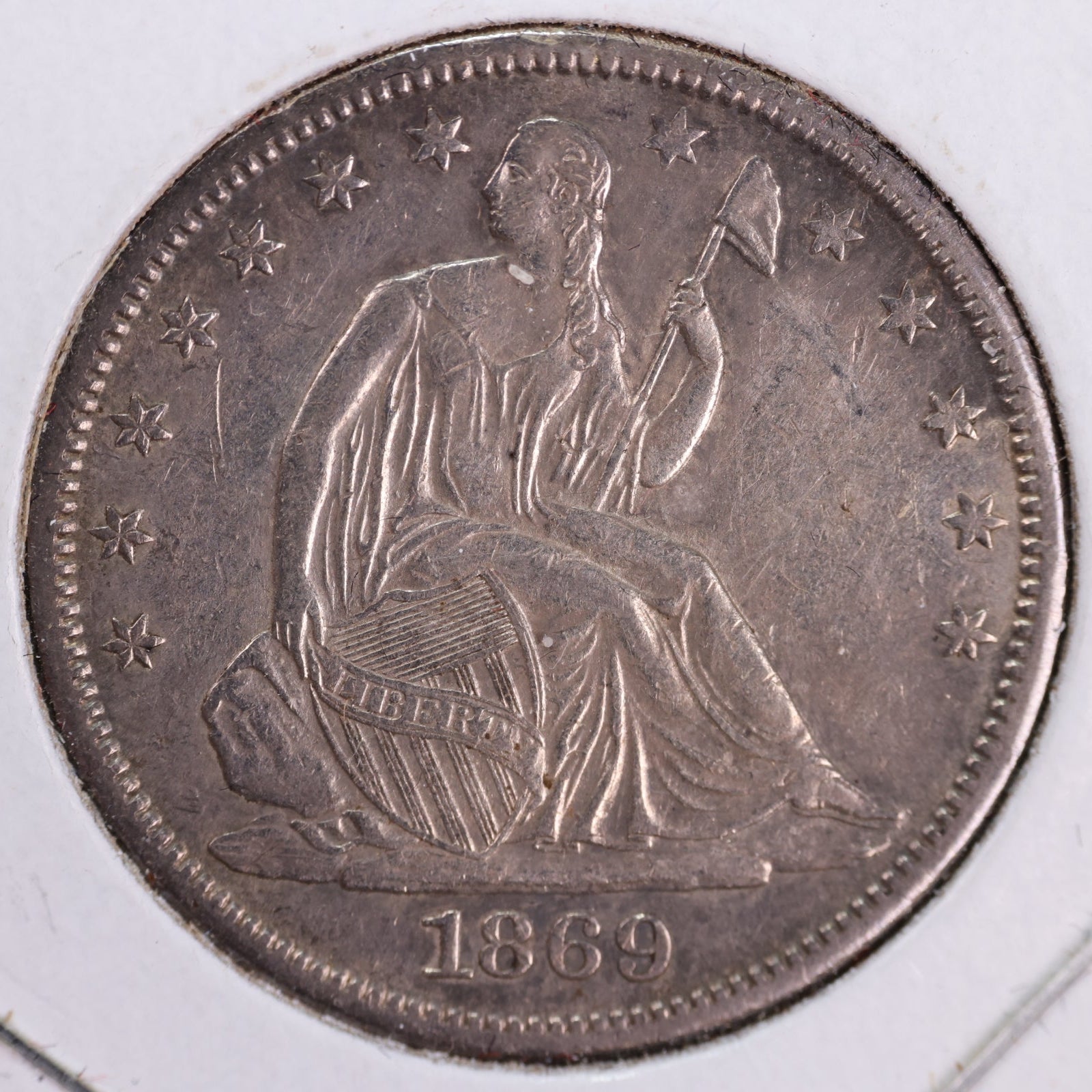 1869-S Liberty Seated Half Dollar, About Uncirculated Coin. Store #HR1993