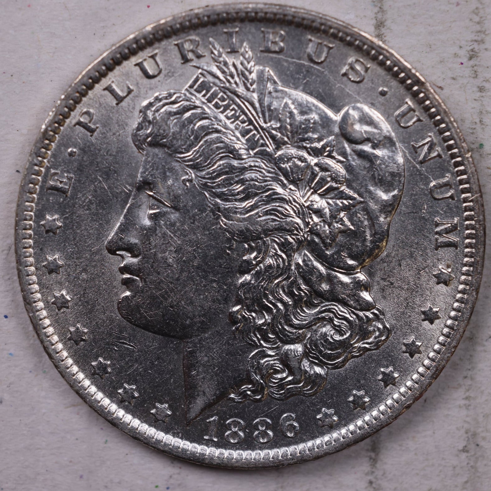 1886-O Morgan Dollar, About Uncirculated+, 'SLIDER', Store #501