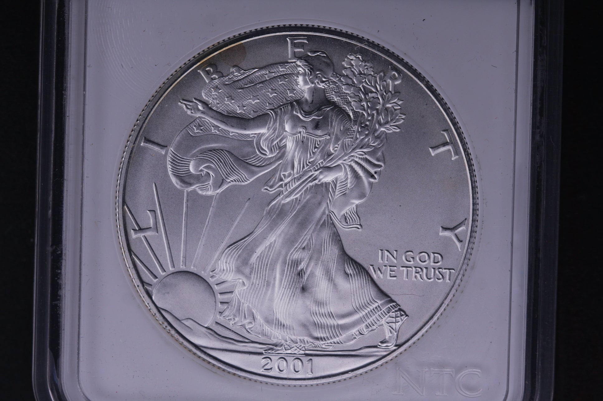 2001 Silver Eagle $1. WTC Ground Zero Recovered. Store #AE0060