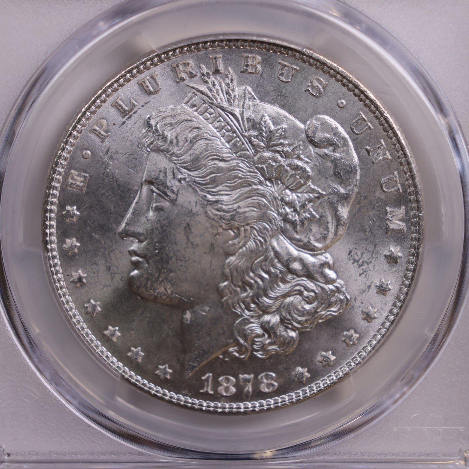 1878 Morgan Silver Dollar, 7 T.F, Rev 1878, PCGS MS-63., Store #GDR0120.