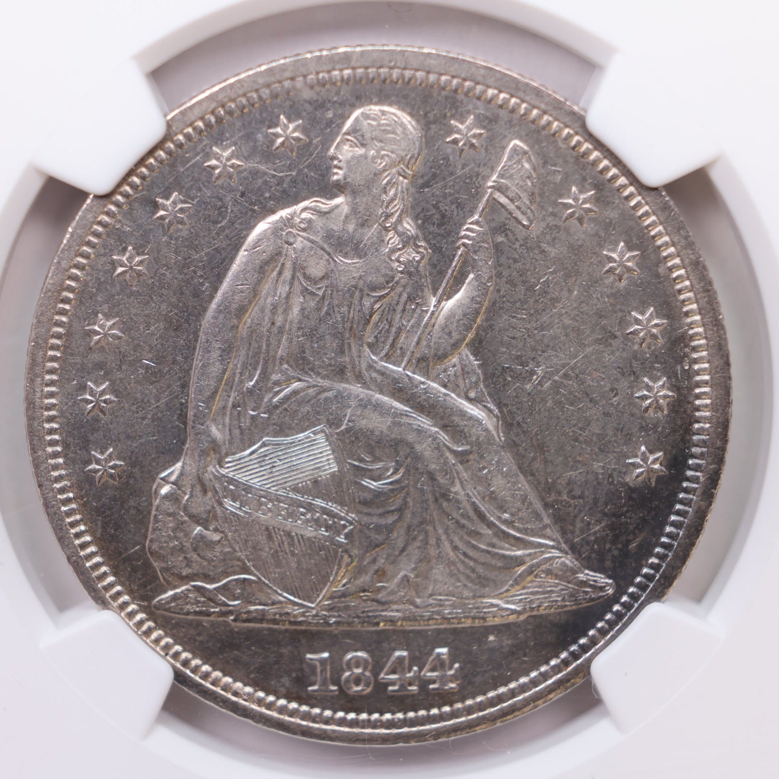 1844 Seated Liberty Silver Dollar, NGC Certified AU-58, Store #GDR0330.