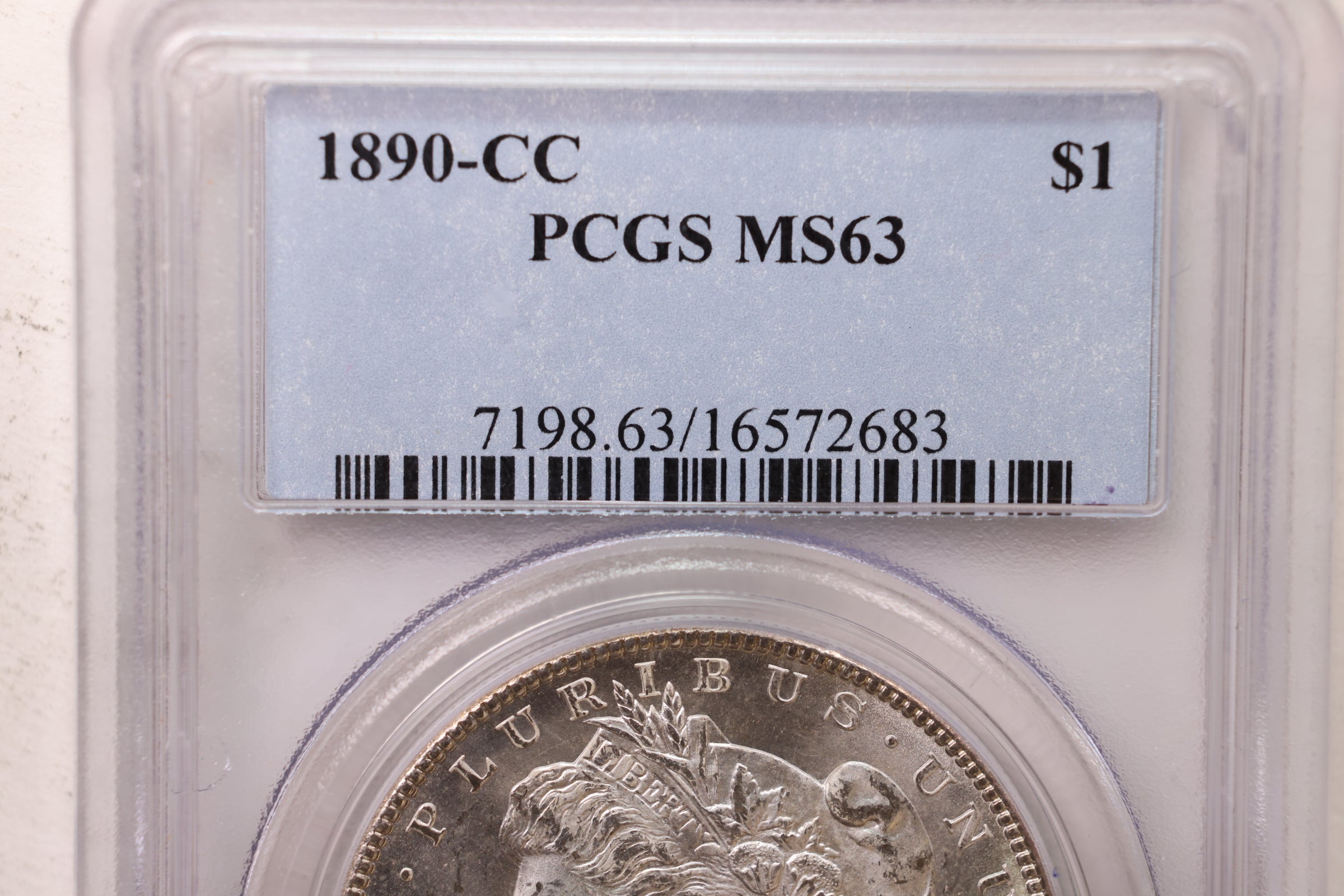 1890-CC Morgan Silver Dollar., PCGS Certified MS-63., Store #GM003
