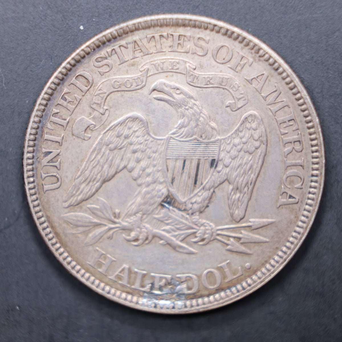 1869 Seated Liberty Silver Half Dollar, About Uncirculated Coin, Store #HR2074.