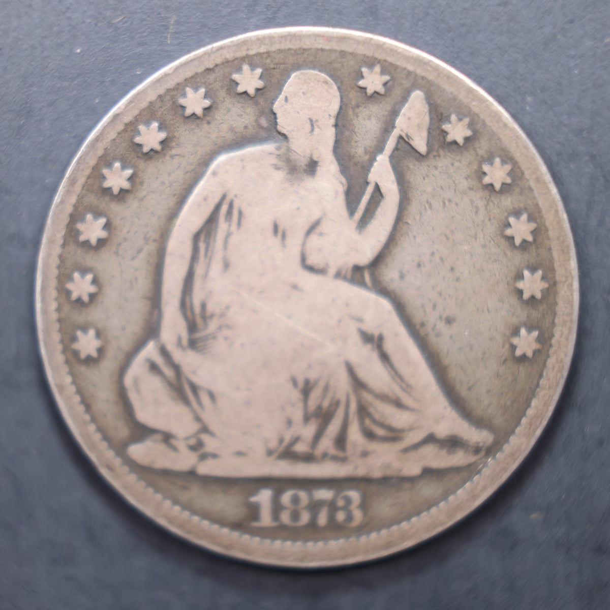 1873-CC Seated Liberty Silver Half Dollar, Good Plus Circulated Coin, Store #HR2081.