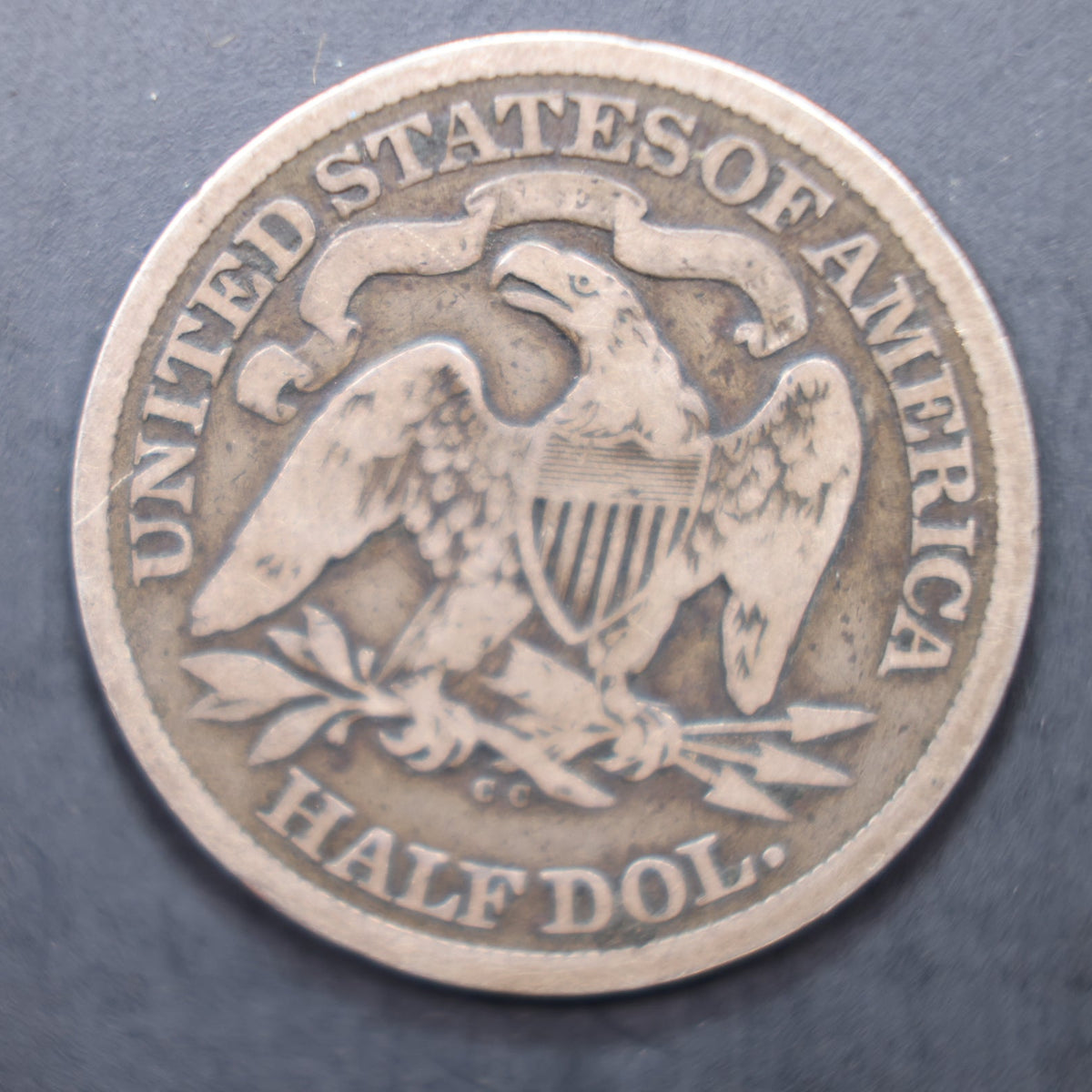 1873-CC Seated Liberty Silver Half Dollar, Good Plus Circulated Coin, Store #HR2081.
