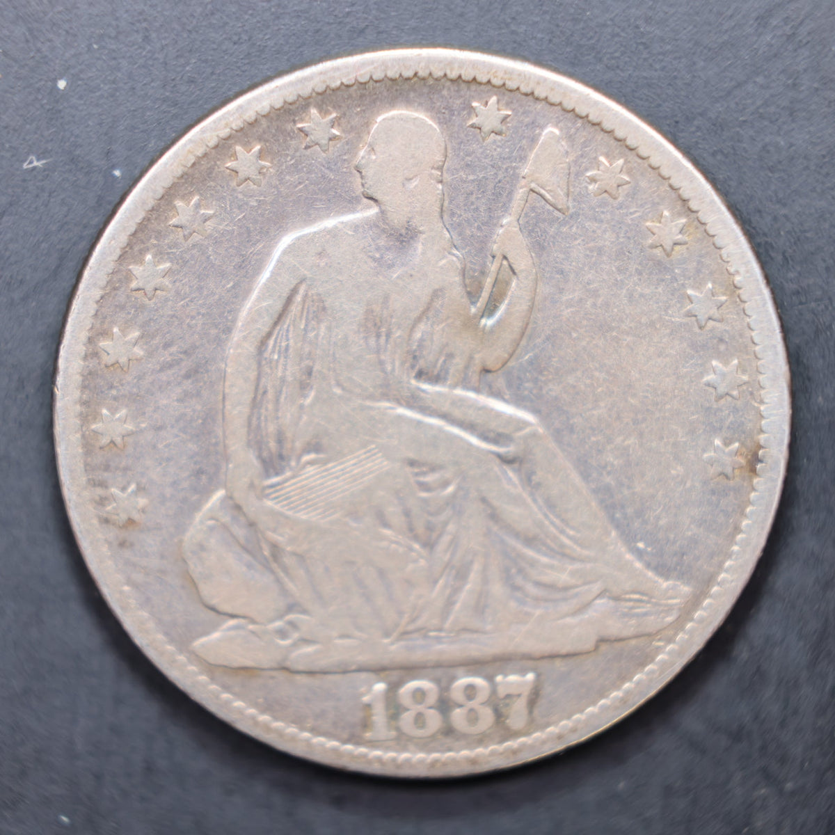 1887 Seated Liberty Silver Half Dollar, Very Good + Circulated Coin, Store #HR2121.