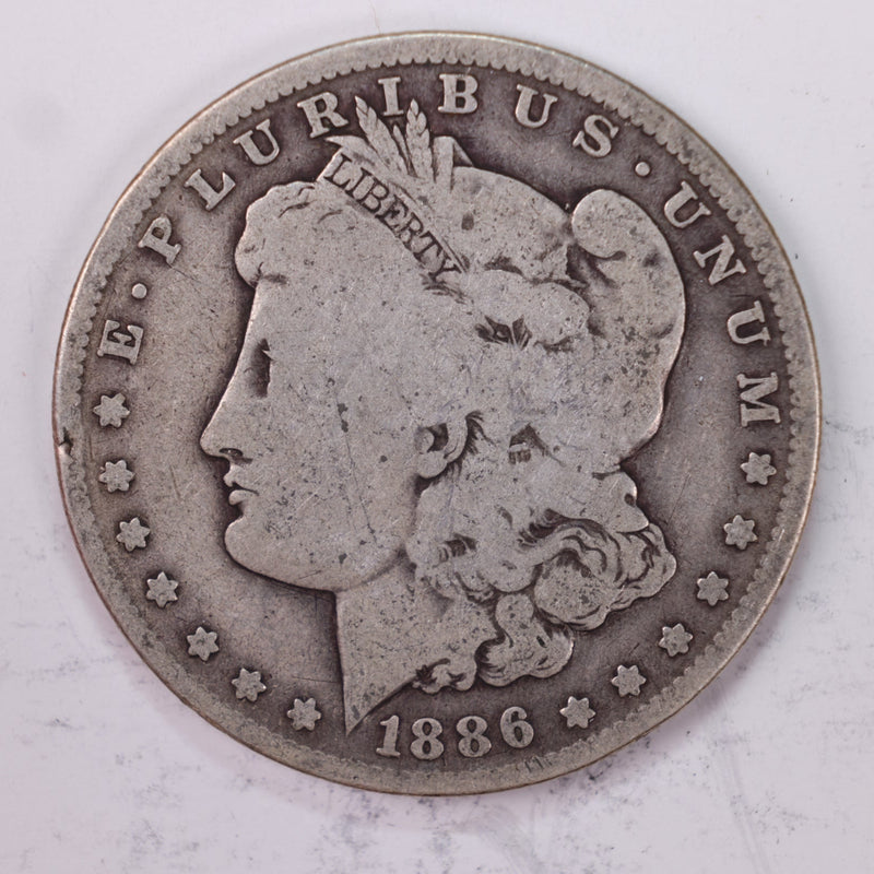 1886-O Morgan Silver Dollar., Very Good., Circulated Coin, Store