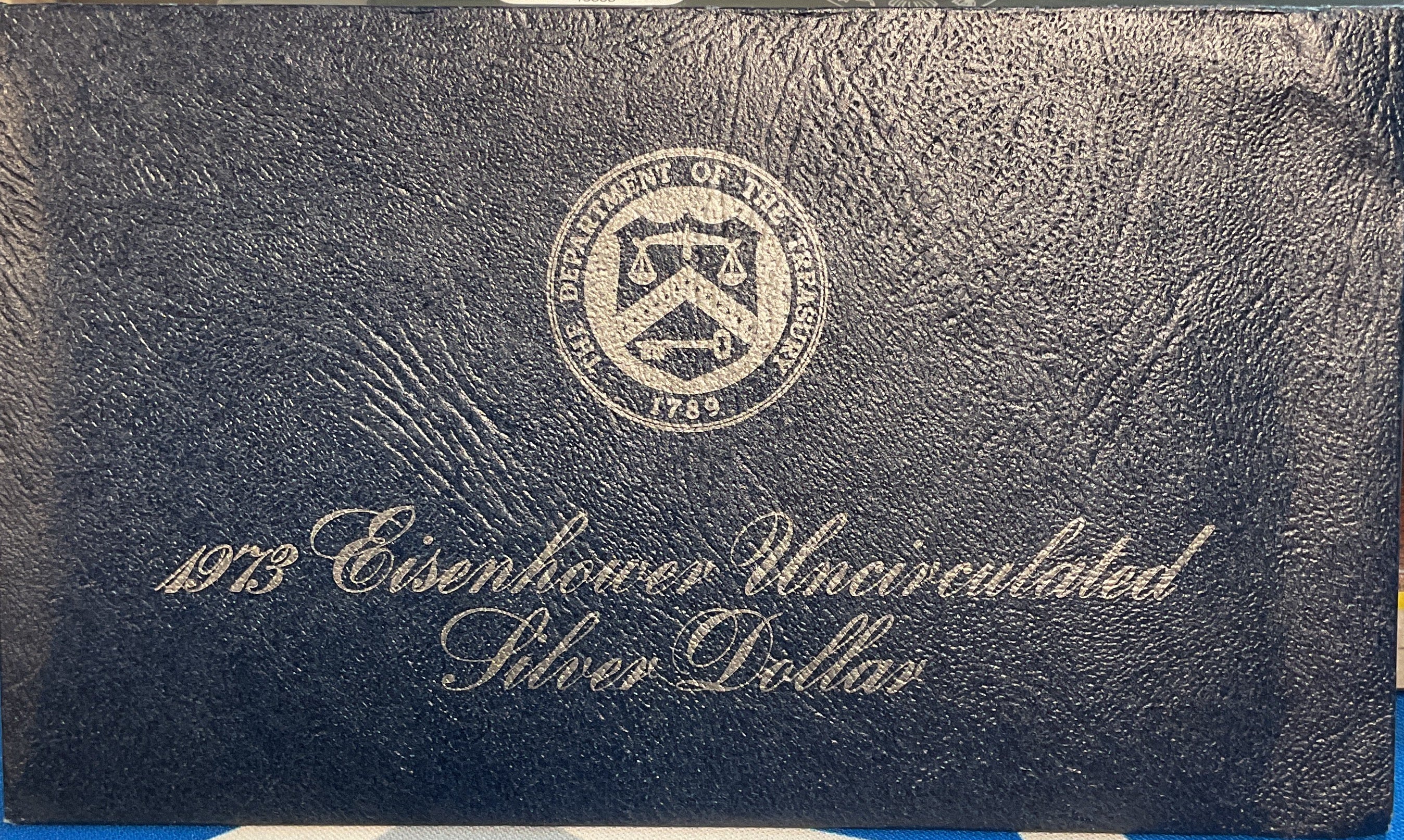 1973 Eisenhower Uncirculated Silver Dollar. Store #PT052