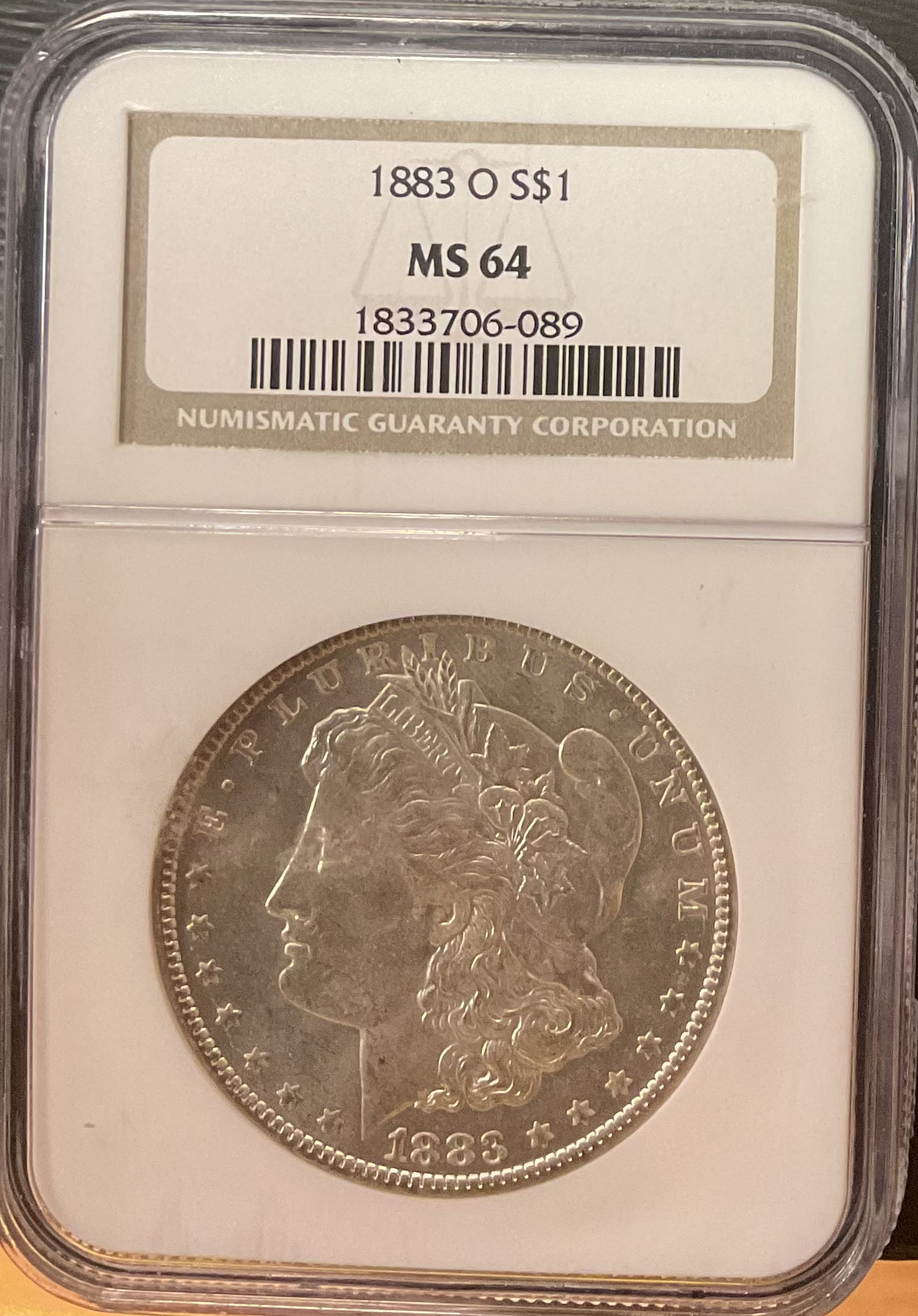 1883-O Morgan Silver Dollar, NGC Graded MS 64 UNC.  Store #DR1577