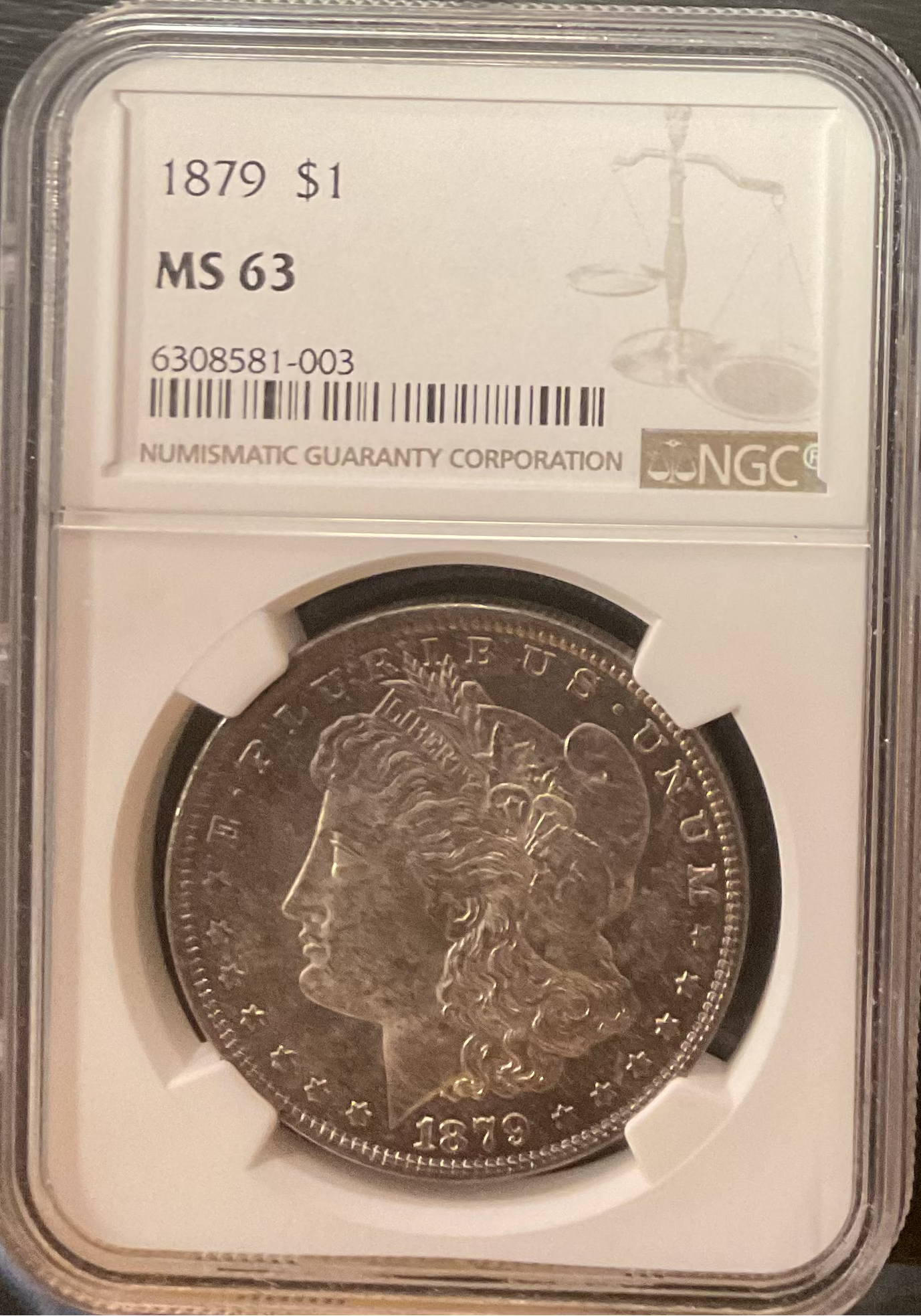 1879 Morgan Silver Dollar, NGC Graded MS 63. Store Sale #DR0560.