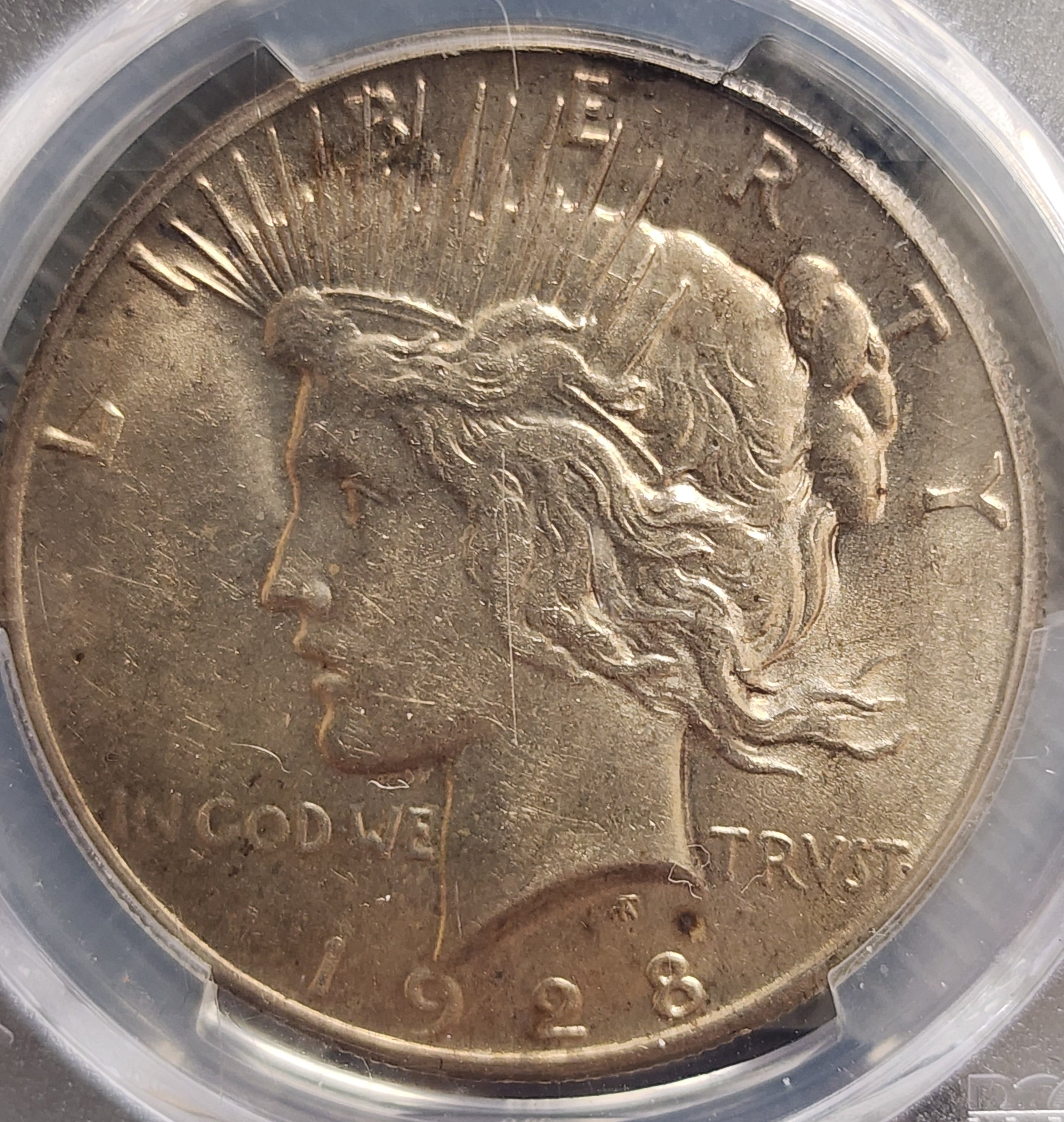 1928 Peace Silver Dollar., PCGS AU-58. Slider, 'Key Date Coin', Store #DR0649