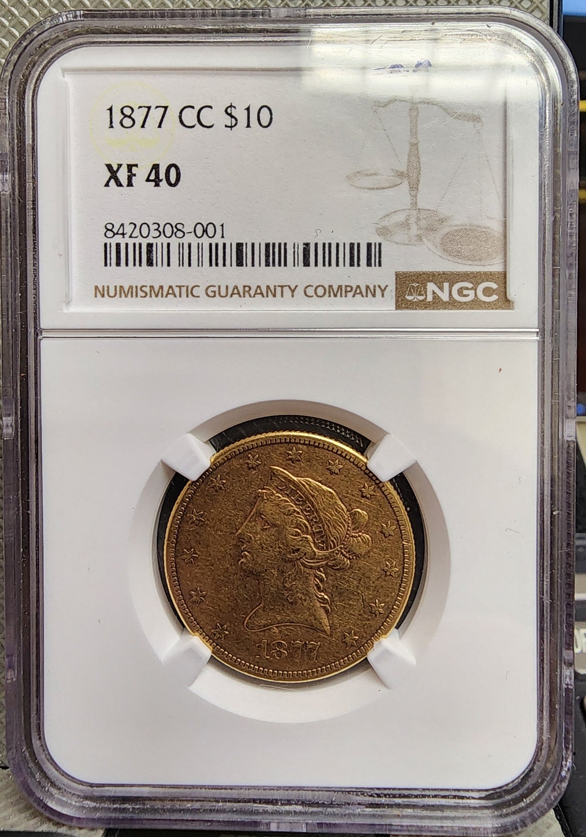 1877-CC $10, Gold Eagle, 'Hard Date', NGC XF-40, Circulated Coin, Store #G017.