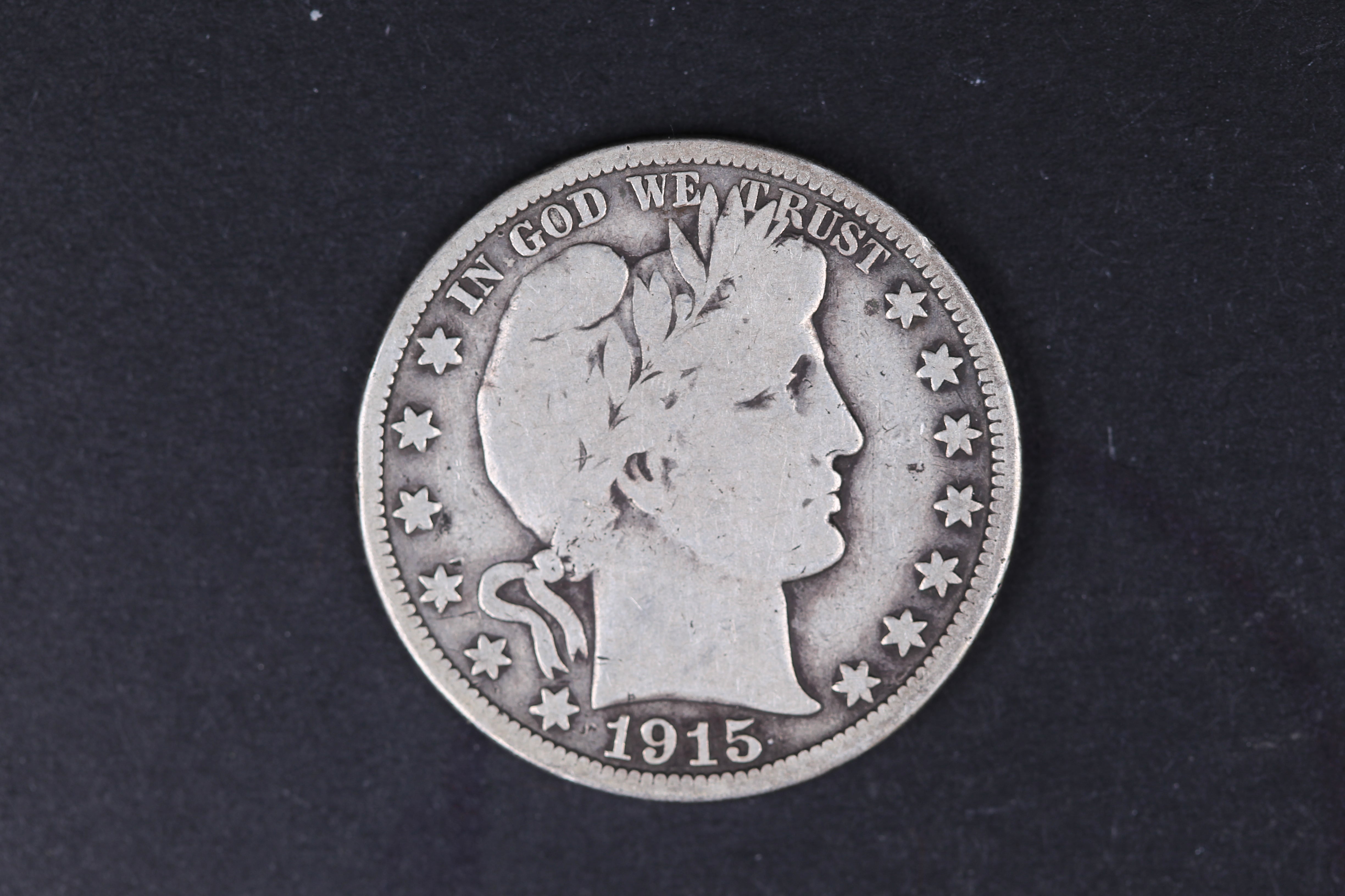 1915 Barber Half Dollar, Very Good Circulated Coin. Store #HR427