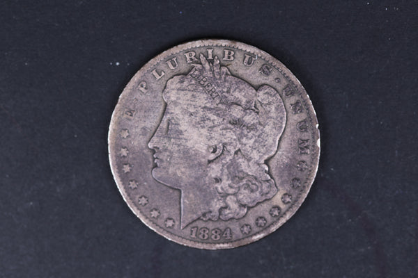 1884-CC Morgan Silver Dollar. Very Good Circulated Coin. Store #07740