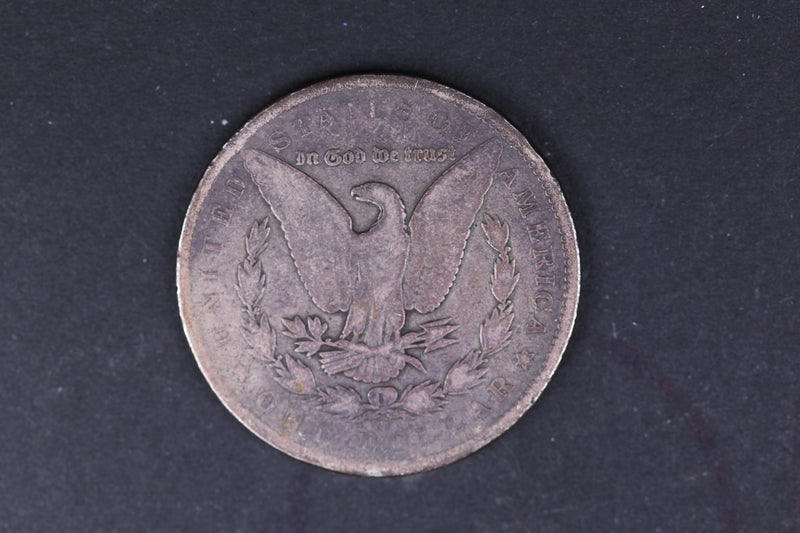 1884-CC Morgan Silver Dollar. Very Good Circulated Coin. Store