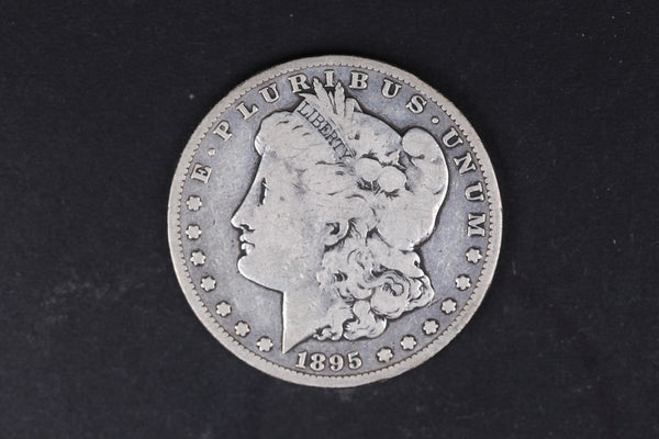 1895-S Morgan Silver Dollar, Very Good Circulated Coin. Store #07758