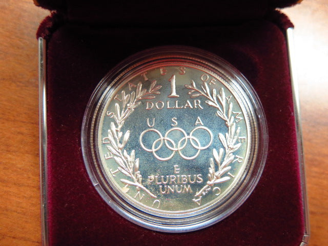 1988-S Olympic Proof Silver Dollar Commemorative. In Original Government Packaging. Store