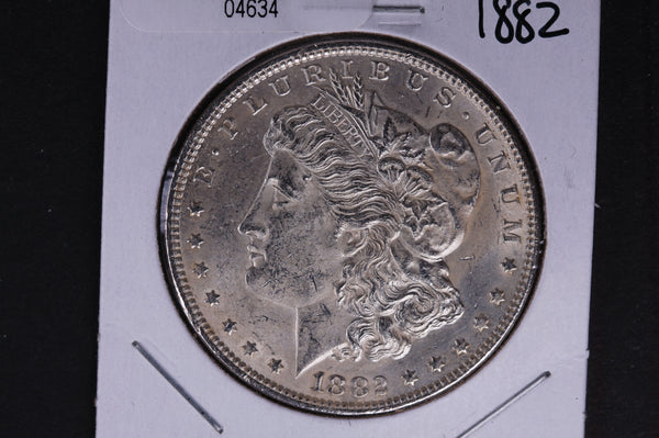 1882 Morgan Silver Dollar, About Un-Circulated condition.  Coin Store #04634