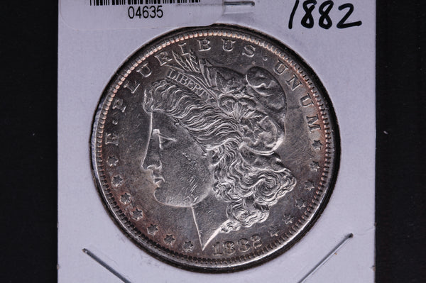 1882 Morgan Silver Dollar, About Un-Circulated condition.  Coin Store #04635