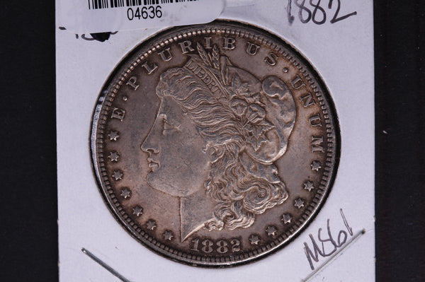1882 Morgan Silver Dollar, Un-Circulated, Toned condition.  Coin Store #04636