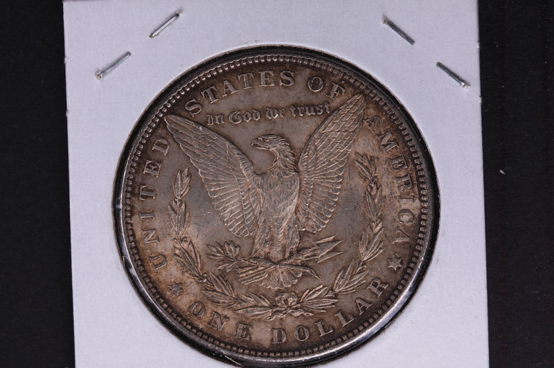 1882 Morgan Silver Dollar, Un-Circulated, Toned condition.  Coin Store