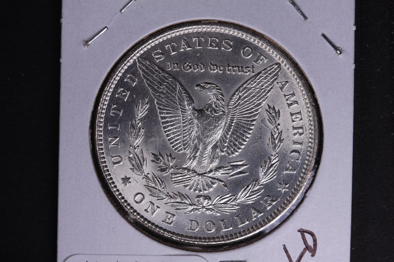 1884 Morgan Silver Dollar, Brilliant Un-Circulated condition. Coin Store