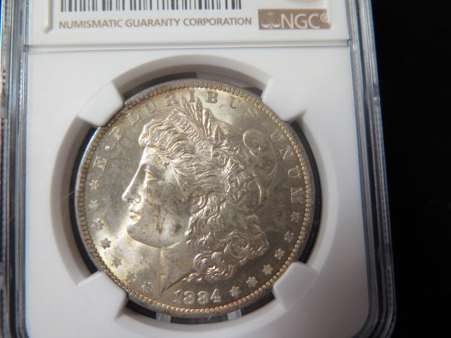 1884-O Morgan Silver Dollar, NGC Graded MS 63 UNC.  Store