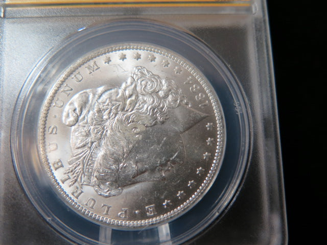 1884-O Morgan Silver Dollar, ANACS Graded MS 63 UNC.  Store