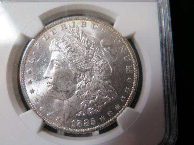 1885-O Morgan Silver Dollar, NGC Graded MS 63 UNC.  Store