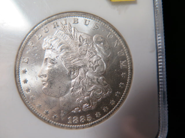 1885-O Morgan Silver Dollar, NGC Graded MS 63 UNC.  Store