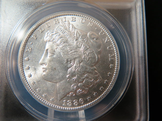 1886 Morgan Silver Dollar, ANACS Graded AU 58.  Store