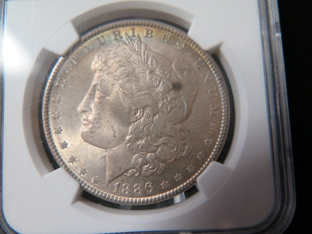 1886 Morgan Silver Dollar, NGC Graded MS 65.  Store