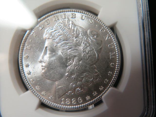 1886 Morgan Silver Dollar, NGC Graded MS 63.  Store