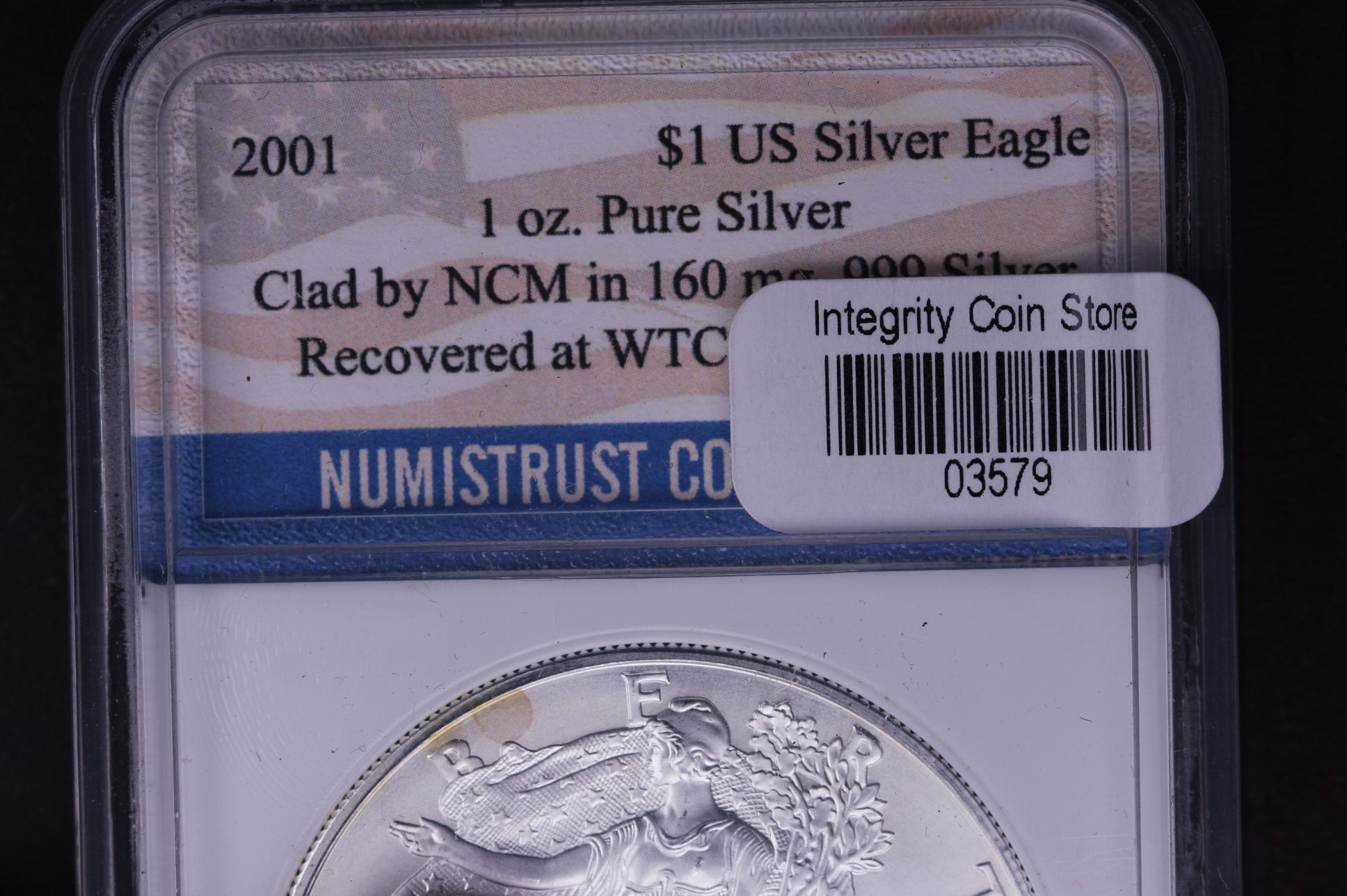 2001 Silver Eagle $1. WTC Ground Zero Recovered. Store #AE0060