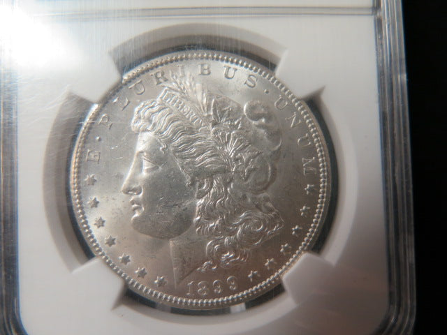 1899-O Morgan Silver Dollar, NGC Graded MS 63 UNC.  Store