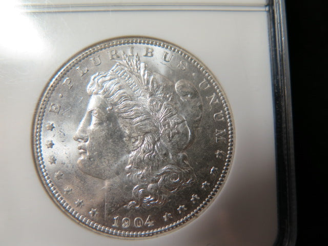 1904-O Morgan Silver Dollar, NGC Graded MS 63 UNC.  Store