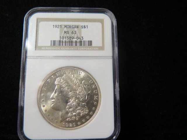 1921 Morgan Silver Dollar, NGC Graded MS 63 UNC.  Store