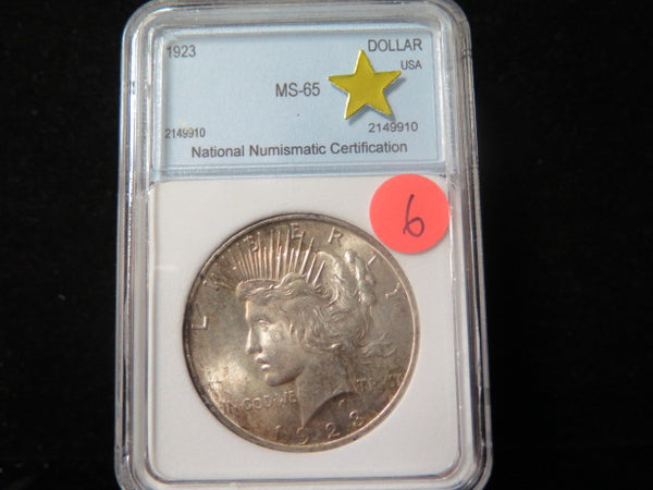 1923 Peace Silver Dollar, NNC Graded MS 65 Uncirculated Coin. Store #03287