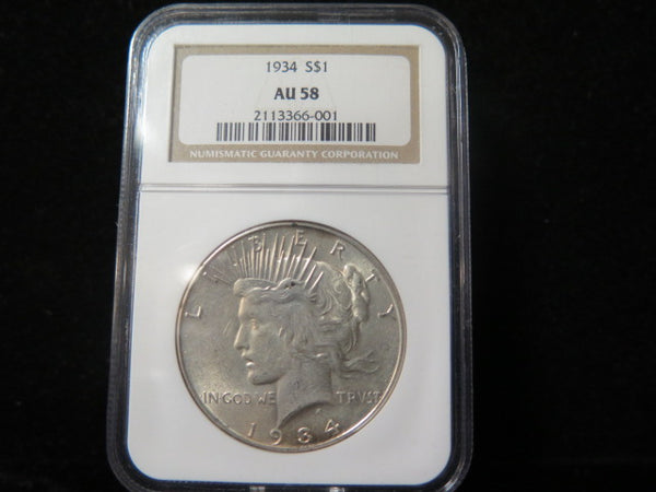 1934 Peace Silver Dollar, NGC Graded AU 58 Circulated Coin. Store #03302