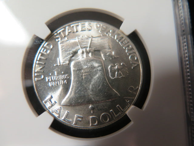 1957 Franklin Half Dollar. NGC Graded MS 63 Uncirculated Coin. Store