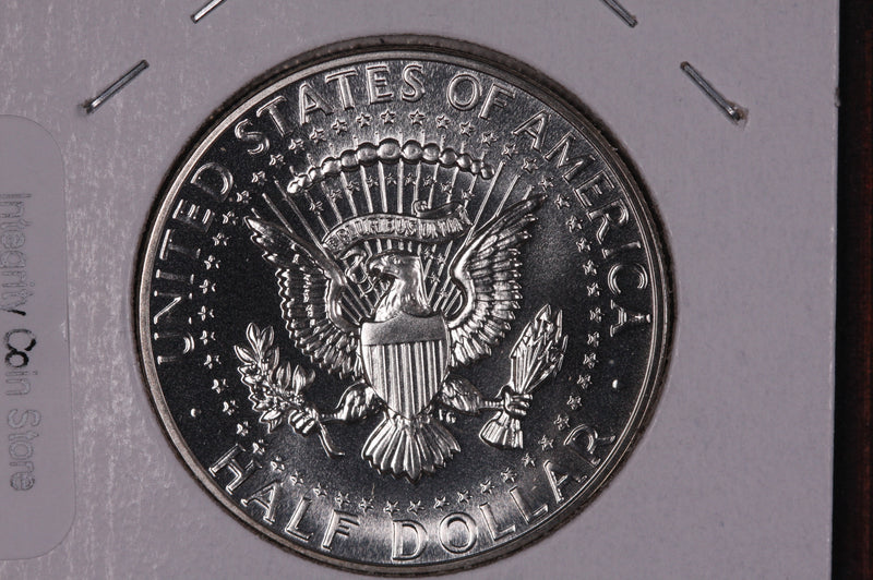 1964 Kennedy Half Dollar. Modern Half. Gem UN-Circulated. Store