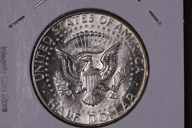 1965 Kennedy Half Dollar. Modern Half. Gem UN-Circulated. Store