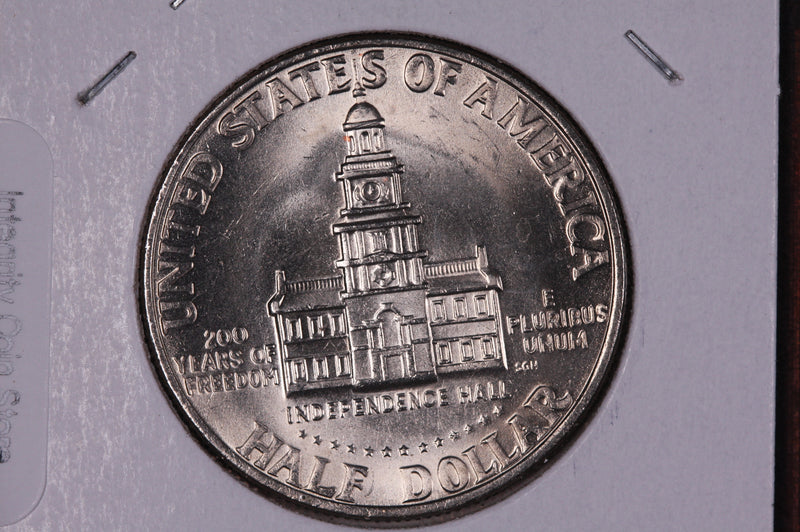 1976 Kennedy Half Dollar. Modern Half. Gem UN-Circulated. Store